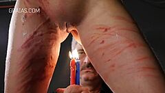 girl punished with hot candles in garage bdsm