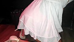 She gives him a blowjob on the swing