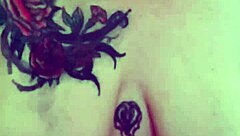 applying lotion to mature boobs