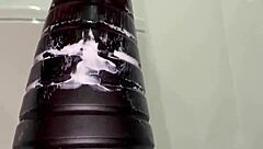 Closeup of deep anal insertion with toy