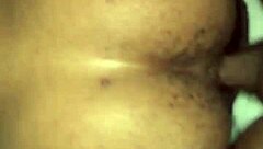 Ebony beauty takes on a big black cock in doggystyle