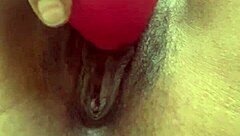 Ebony teen plays with pussy