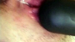 A stunning blonde girl achieves orgasm and squirts while pleasuring herself