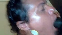 the shemale sucks the african's big black cock until he cums