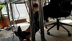 In the bustling office, a playful shoeplay moment captures attention