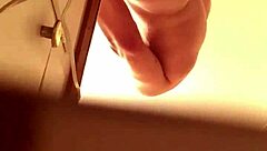 Spying girlfriend catches him jacking off