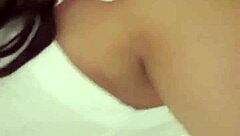 dancing in red panties showing small tits.