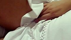 dancing in red panties showing small tits.