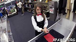 A sexy woman engages in sexual activity in a store