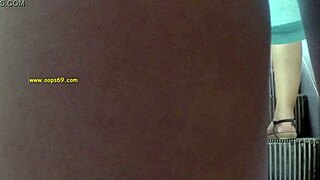 Hey, wanna see this Brazilian milf in a mini dress teasing upskirt on the train?